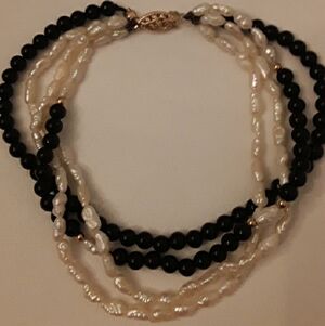 Vintage four strand bracelet with Oynx, rice pearl, 14k beads and clasp